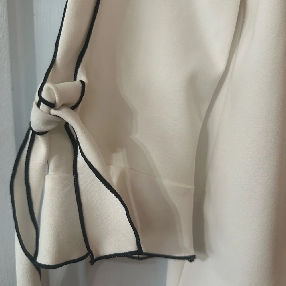 Chico's Cream Blouse with Black Piping Ruffled Tie-Sleeves. Size medium. - Picture 2 of 8